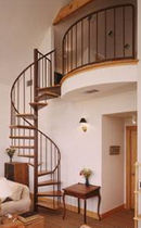 spiral staircase (metal frame and wooden steps) 52S STAIRWAYS inc