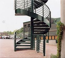 spiral staircase with a lateral stringer for commercial buildings (metal frame and steps) WIMBLEDON Crescent Stairs
