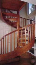 spiral staircase with a lateral stringer (wooden frame and steps)  STAIRWAYS inc