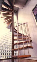 spiral staircase (stainless steel frame and wood steps)  STAIRWAYS inc