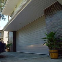 steel sectional garage door IDO-HOME IDOMUS Ltd.