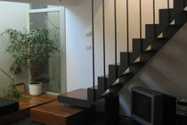 straight staircase with a lateral stringer (metal frame and wood steps) by Marco Dellai  mauropedergnana