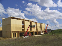 wooden contemporary ecological prefab building for housing development THIONVILLE EN FRANCE HMS Bausysteme