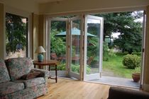 wooden fold-and-slide patio door  Kingsbridge Joinery