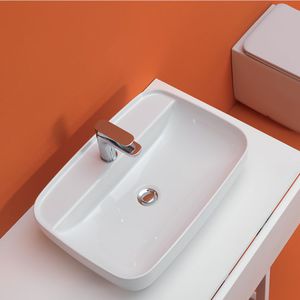 countertop washbasin / oval / ceramic / contemporary