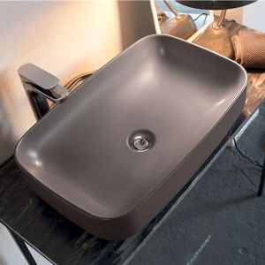 free-standing washbasin / oval / ceramic / contemporary