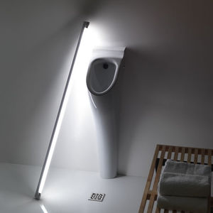 floor-mounted urinal / ceramic