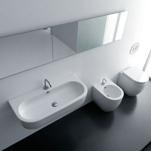 wall-mounted washbasin / oval / ceramic / contemporary