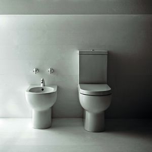 free-standing WC / monobloc / ceramic / with flush button