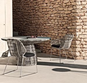 contemporary chair / upholstered / with armrests / sled base