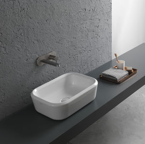 countertop washbasin / rectangular / ceramic / contemporary