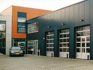 sectional industrial doors / metal / automatic / glazed