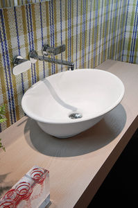 countertop washbasin / oval / ceramic / traditional