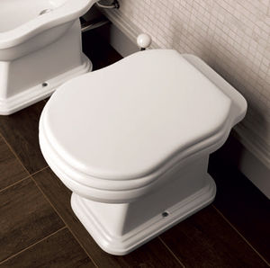free-standing toilet / ceramic