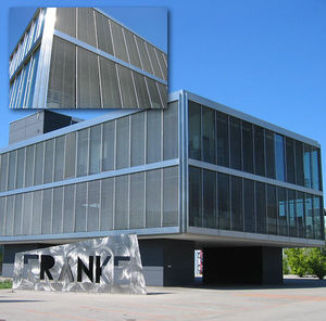 aluminum solar shading / for facades / motorized rotating / vertical