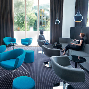 contemporary armchair / metal / fabric / sled base