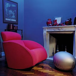 contemporary armchair / fabric / leather / with removable cover
