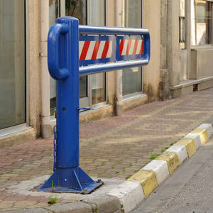 access control barrier / pivoting / steel / for public spaces