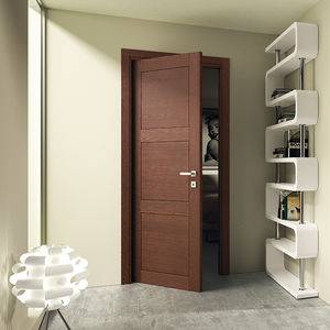indoor door / pivoting with offset axis / solid wood