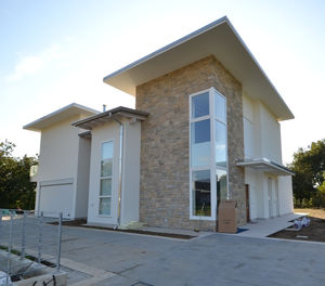prefab house / modular / contemporary / concrete