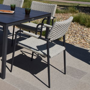contemporary chair / stackable / with armrests / aluminum