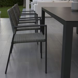 contemporary chair / stackable / with armrests / waterproof