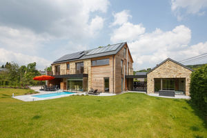 prefab house / log / contemporary / wooden frame