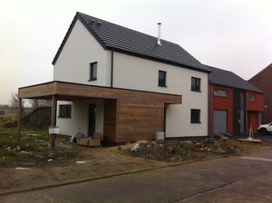 prefab house / log / contemporary / wooden frame