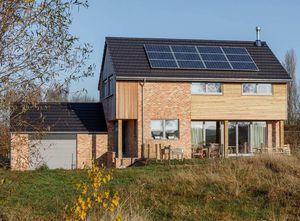 prefab house / log / contemporary / wooden frame
