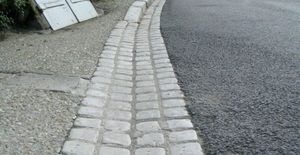 paved drainage channel / street / high-performance concrete / sloped