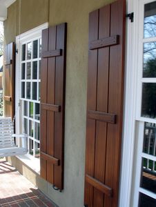 swing shutters / wooden / window