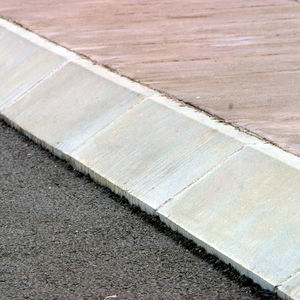 sidewalk edge / concrete / angled