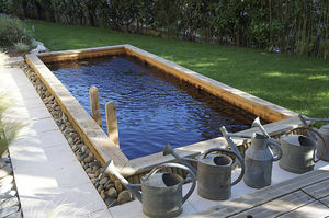 in-ground swimming pool / wooden / custom / with natural filtration