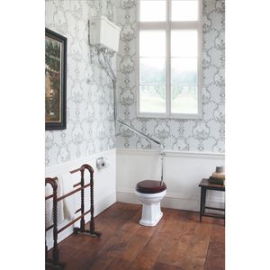 free-standing toilet / porcelain / with high tank
