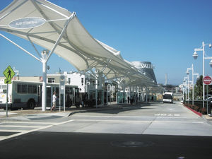cable-and-membrane tensile structure / metal frame supported / canopy / for facades