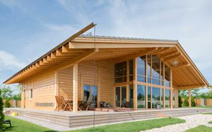 prefab house / contemporary / glue-laminated wood / energy-efficient