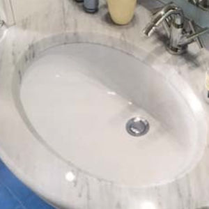 undercounter washbasin / oval / ceramic / contemporary