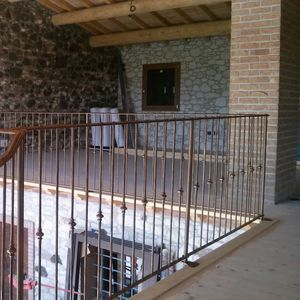 wrought iron railing / with bars / outdoor / for patios