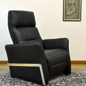 contemporary armchair / leather / fabric / with headrest