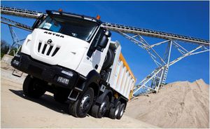 rear unloading dump truck / rubber-tired / diesel / for construction
