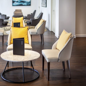 contemporary chair / upholstered / ergonomic / fabric