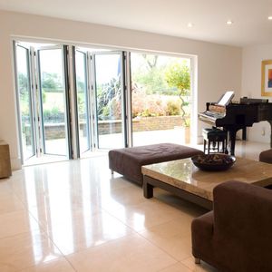folding patio door / aluminum / double-glazed / thermally-insulated