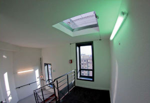 contemporary wall light / polycarbonate / lacquered steel / fluorescent