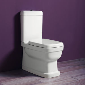 free-standing WC / monobloc / ceramic / with flush button