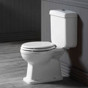 free-standing WC / monobloc / ceramic / with flush button