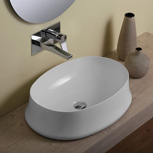 countertop washbasin / oval / ceramic / contemporary