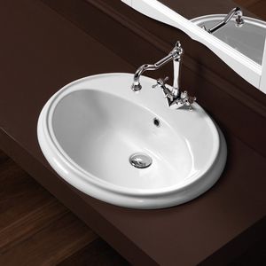 built-in washbasin / oval / ceramic / contemporary