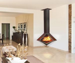 wood-burning fireplace / contemporary / closed hearth / corner
