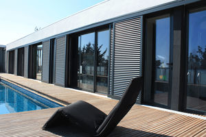 sliding shutters / aluminum / for facades / thermal break