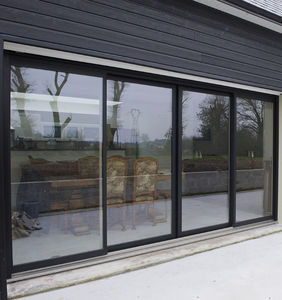 sliding patio door / wooden / aluminum / double-glazed